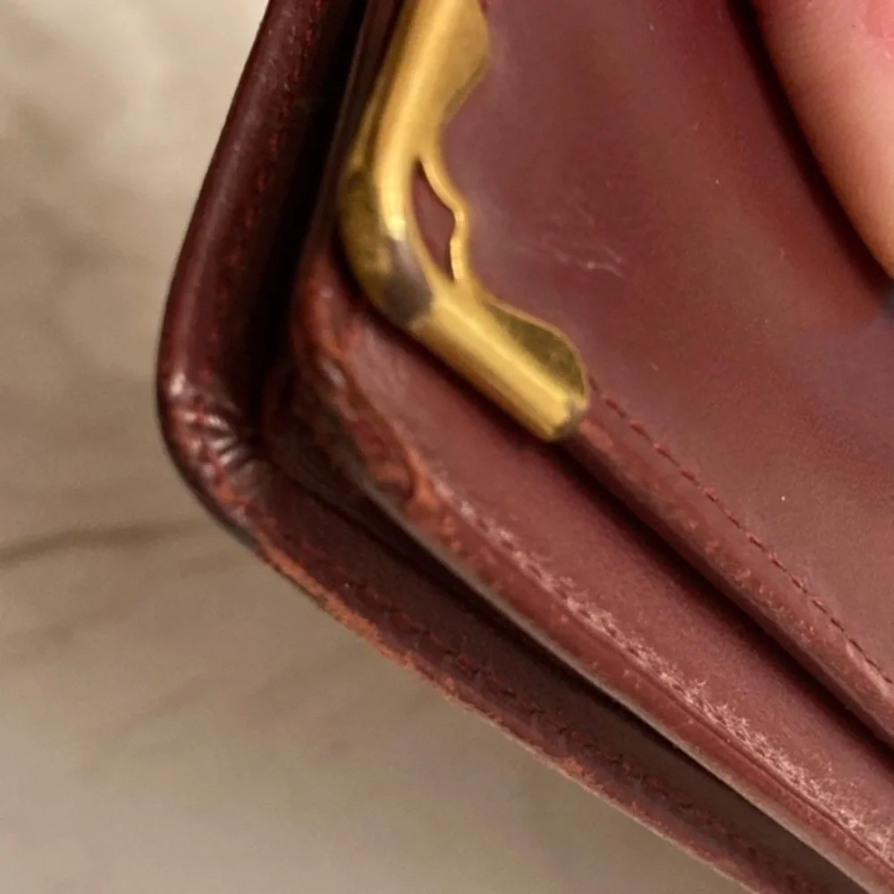 Cartier burgandy leather long slim wallet